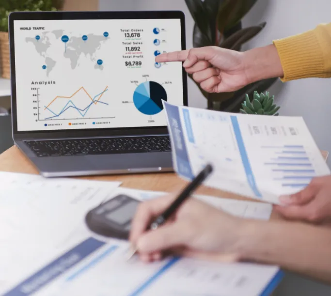 A fintech firm checking their financial data using a fintech software developed by dedicated developers.